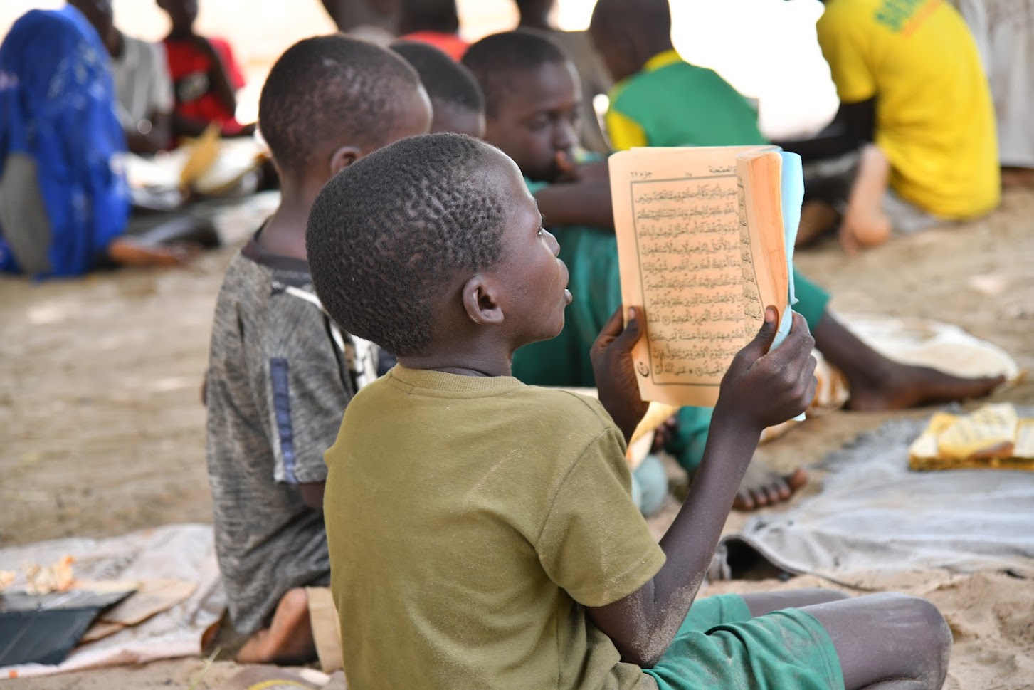 A child learning the Koran in a daara in Méouane health post in Tivaouane.